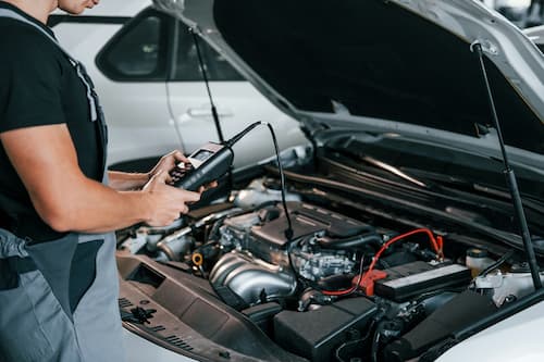 Technician reading live diagnostic data from a German vehicle at Bachmobile in Tomball, Texas