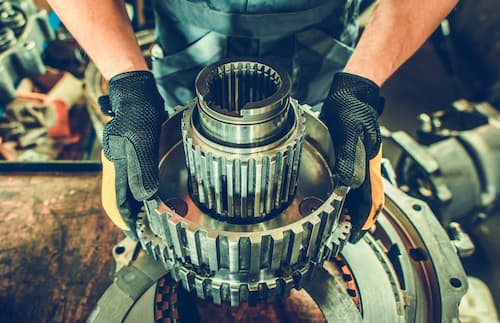 Transmission service being carried out on a German vehicle at Bachmobile in Tomball, Texas
